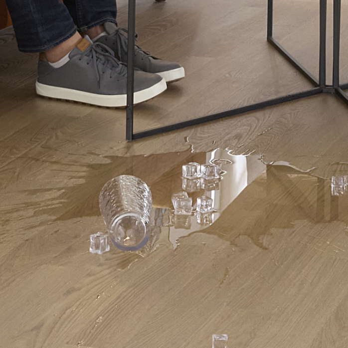 Ice water spilled on a waterproof floor by Pergo